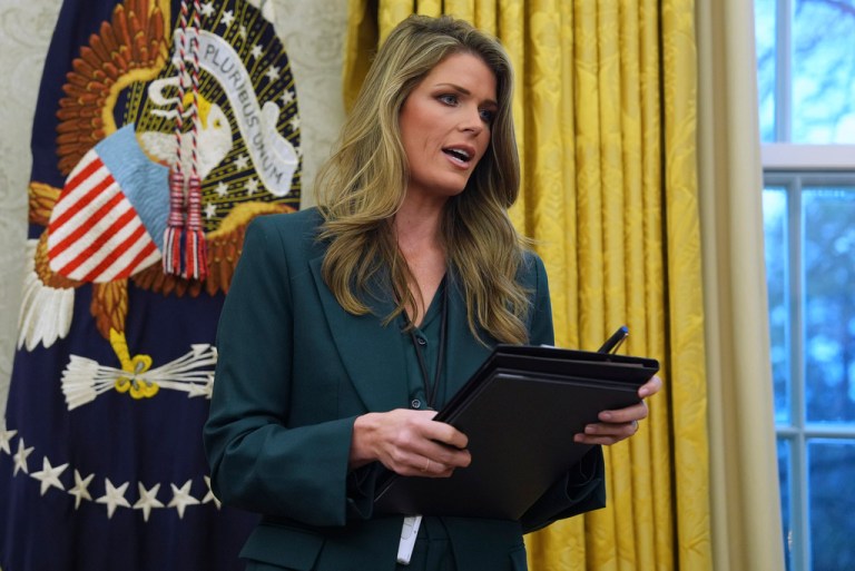 Lindsey Halligan speaks as President Donald Trump signs executive orders in the Oval Office of the White House.