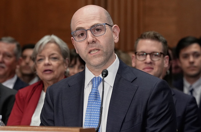 Stephen Miran testifies during a Senate Banking Committee hearing.