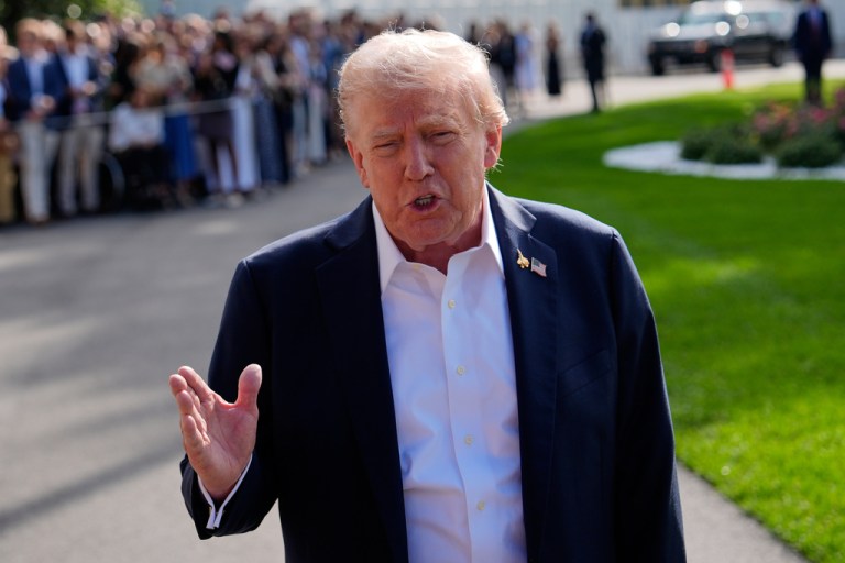 President Donald Trump speaks with reporters before departing the White House, Friday, Sept. 26, 2025, in Washington.