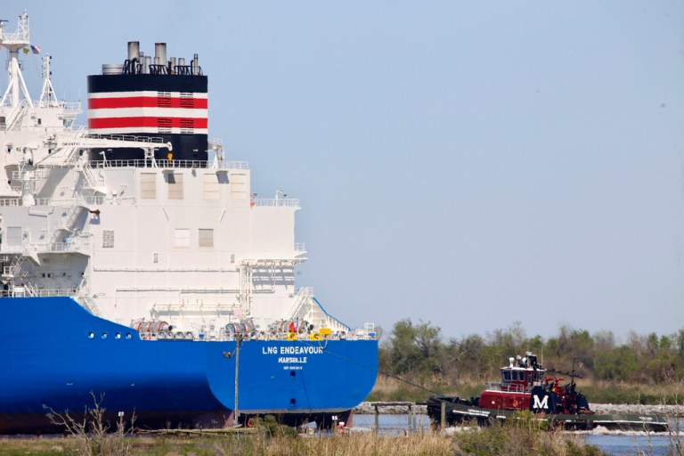 A tugboat helps guide a French ship, the LNG Endeavor, near Hackberry, La., on March 31, 2022. The ship was on its way to the Cameron LNG export facility to pick up liquified natural gas. Attacks by Yemen's Houthi rebels are posing a new threat to the future of energy supplies to the European Union, which relies on imported oil and natural gas.