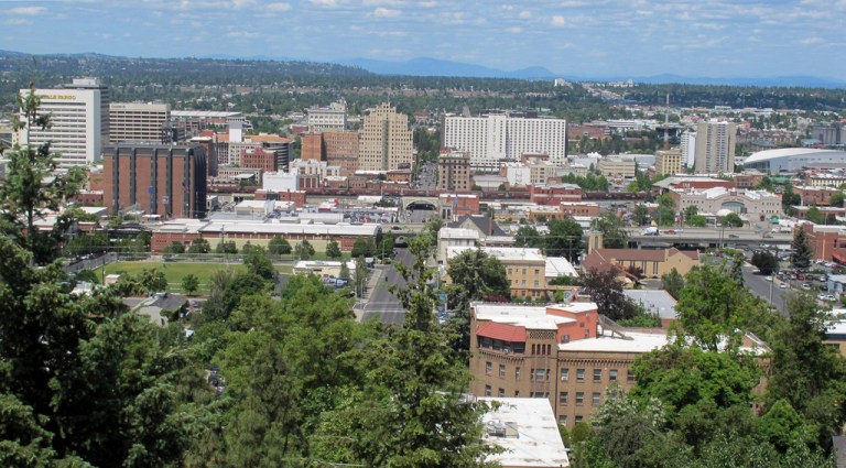 The downtown skyline is shown from the South Hill in Spokane, Wash., on June 4, 2018. The American Civil Liberties Union of Washington has sued the city of Spokane, alleging that its anti-homeless laws violate the state constitution. The group filed the suit on Thursday, Aug. 1, 2024, on behalf of a currently homeless person and someone who was formerly homeless.