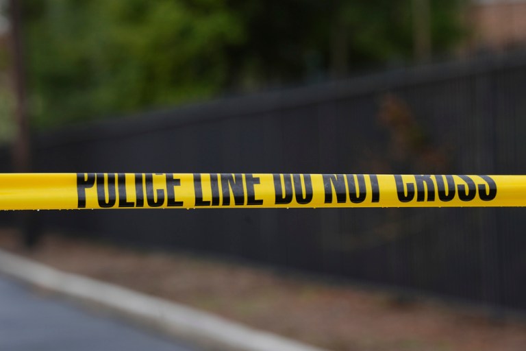 Police tape cordons off an area outside Pennsylvania governor's official residence in Harrisburg, Pa., Monday, April 14, 2025. (AP Photo/Matt Rourke)
