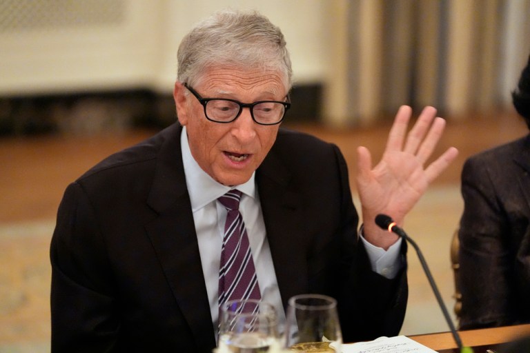 Microsoft founder Bill Gates speaks during a dinner.