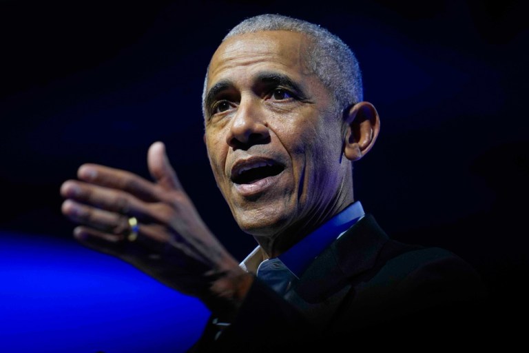 Former President Barack Obama speaks onstage.
