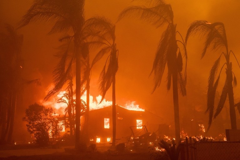 A home burns in the Eaton Fire.