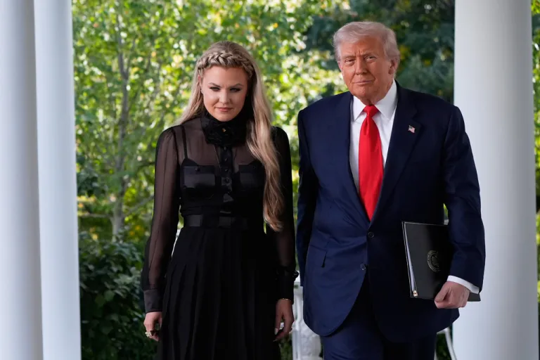 Donald Trump and Erika Kirk standing next to each other outside the White House