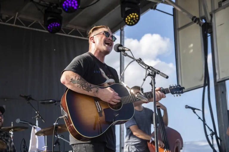 Zach Bryan performs at the Railbird Music Festival on Sunday, Aug. 29, 2021, in Lexington, Ky. The chorus against Ticketmaster’s contentious concert pricing practices is growing, numbering among them Zach Bryan and friends.The country music artist dropped a live album, “All My Homies Hate Ticketmaster,” on Sunday, Dec. 25, 2022. With it came a statement posted to social media in which he decried “a massive issue with fair ticket prices to live shows lately.” (Photo by Amy Harris/Invision/AP, File)