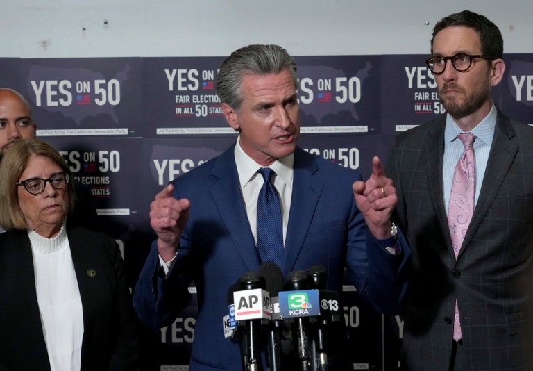Gov. Gavin Newsom speaks after signing legislation calling for a special election on a redrawn congressional map