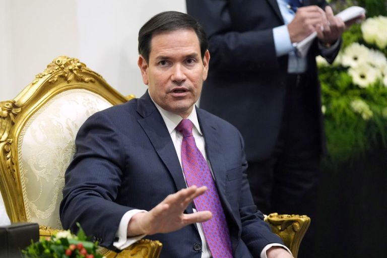 Marco Rubio speaks to reporters.