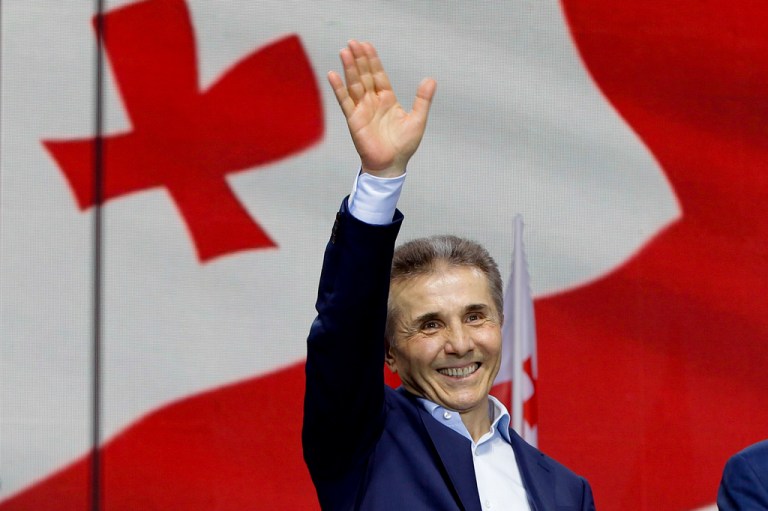 Billionaire Bidzina Ivanishvili, founder and leader of the Georgian Dream party, greets demonstrators during a rally in support of 