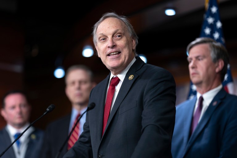 Andy Biggs speaks as members of the conservative House Freedom Caucus tell reporters about allegations that the government spies on Americans, during a news conference at the Capitol in Washington, Feb. 13, 2024.