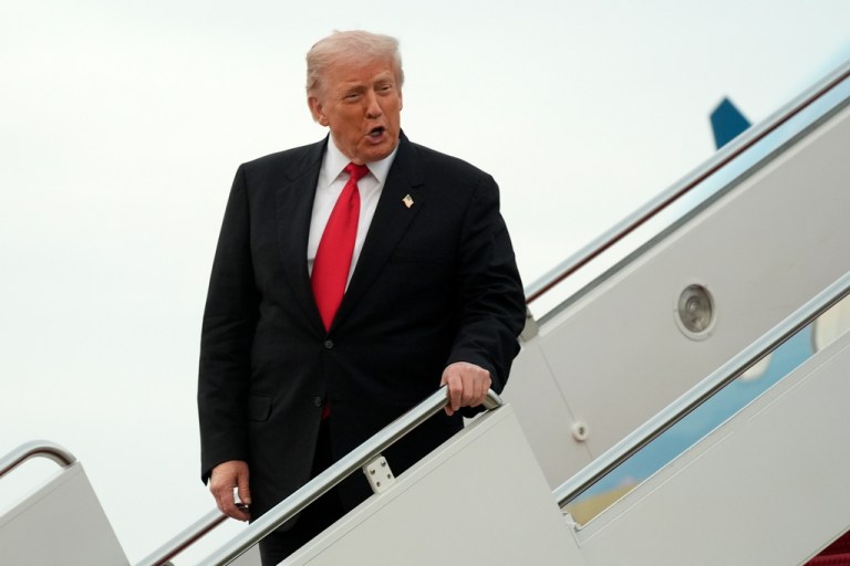 President Donald Trump deplaning Air Force One.