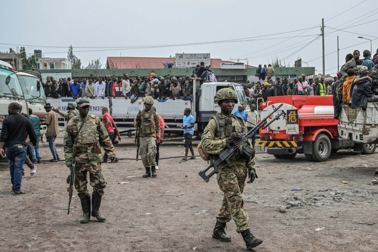FILE - M23 rebels escort government soldiers and police who surrendered to an undisclosed location in Goma, Democratic republic of the Congo, Thursday, Jan. 30, 2025.