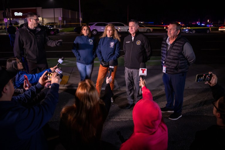 Stockton Mayor Christina Fugazi, center, and other officials provide an update to media at the scene of a mass shooting Saturday, Nov. 29, 2025, in Stockton, Calif. (AP Photo/Ethan Swope)