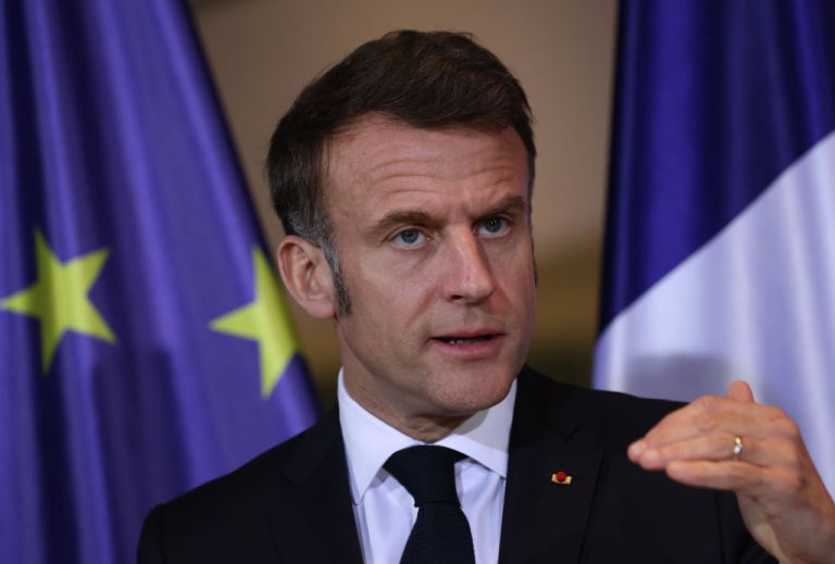 French President Emmanuel Macron speaks to the media following talks at the Chancellery in Berlin, Germany.