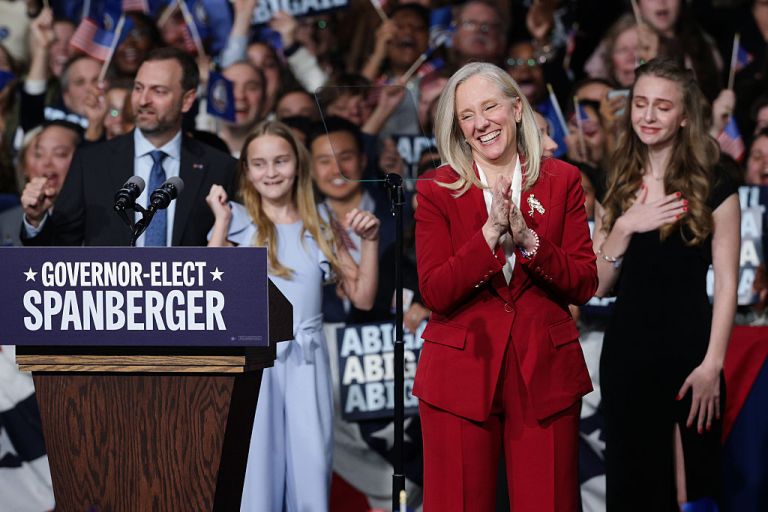 Virginia Democratic gubernatorial candidate, former Rep. Abigail Spanberger celebrates with her family as she takes the stage during her election night rally.