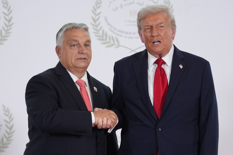 Viktor Orban shakes hands with Donald Trump
