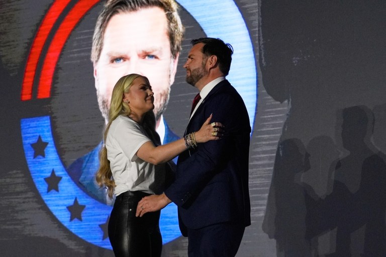 Erika Kirk, left, hugs Vice President JD Vance