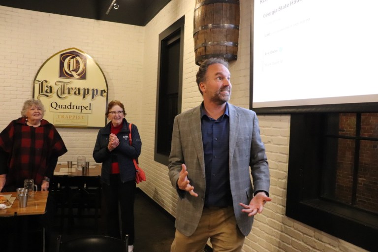 Democrat Eric Gisler talks to supporters about his election victory in a Georgia state House race on Tuesday, Dec. 9, 2025 at the Trappeze Pub in Athens, Georgia.