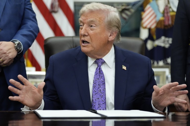 President Donald Trump gestures