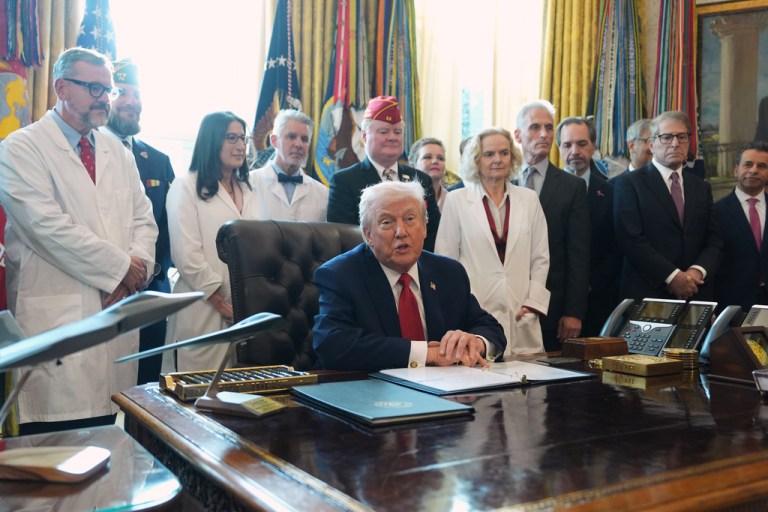President Donald Trump speaks during an executive order signing