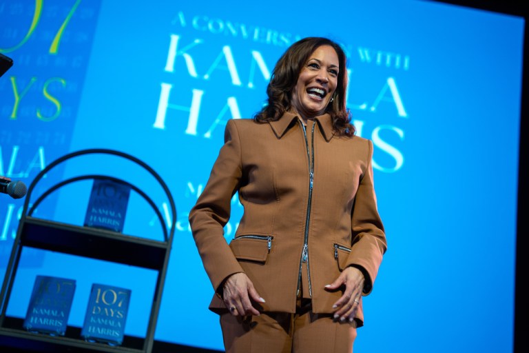 Former Vice President Kamala Harris exits the stage after the first stop of her book tour for a new book about her presidential campaign, 