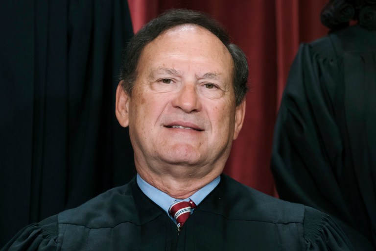 Associate Justice Samuel Alito joins other members of the Supreme Court as they pose for a new group portrait