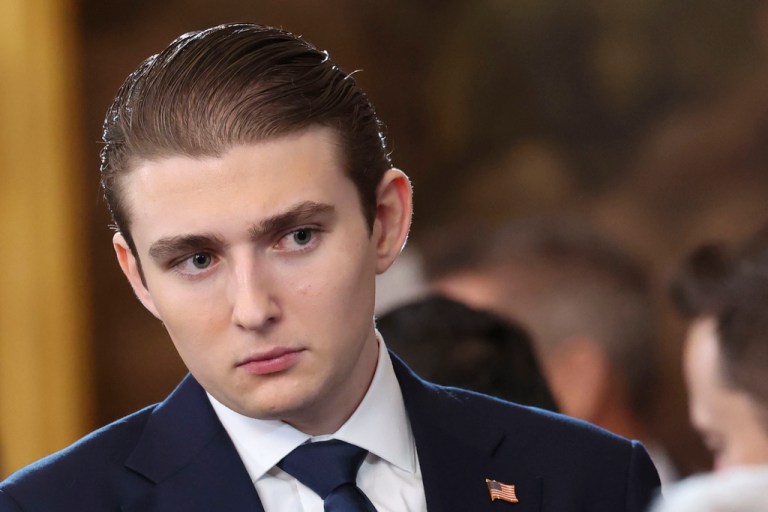 Barron Trump poses for a picture