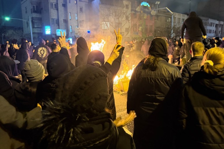 Iranians attend an anti-government protest in Tehran.