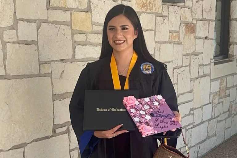 Any Lucia Lopez Belloza celebrates her high school graduation.
