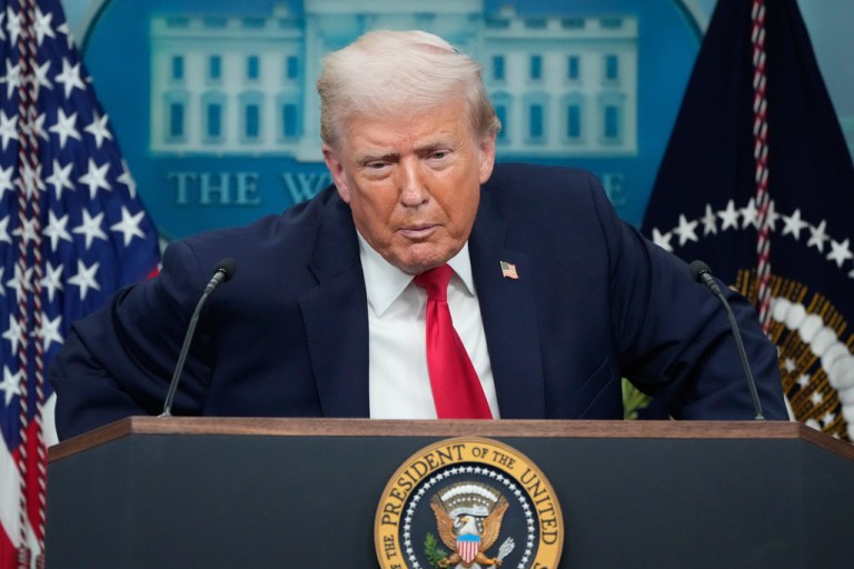 Trump speaks to reporters at the White House