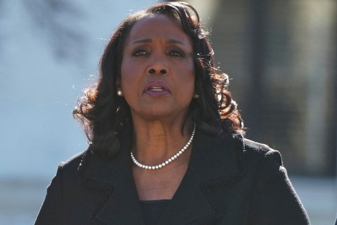 Federal Reserve governor Lisa Cook leaves the Supreme Court in Washington.