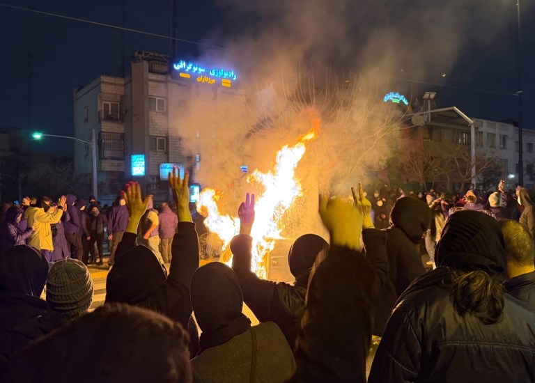 Iranians attend an anti-government protest in Tehran, Iran.