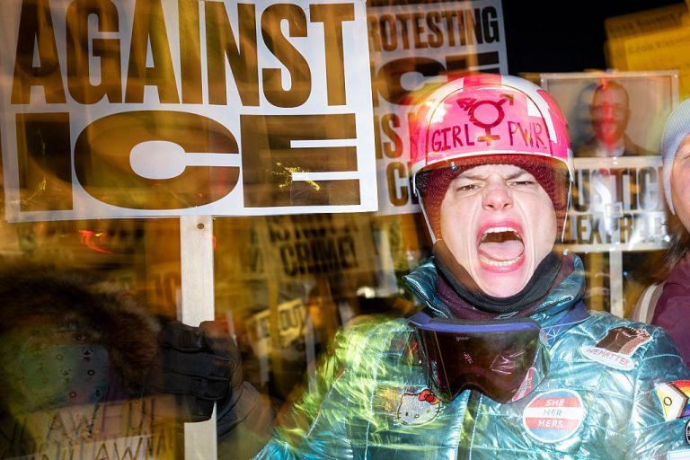 A group of anti-US Immigration and Customs Enforcement (ICE) protesters shout slogans in downtown Minneapolis, Minnesota, on January 27, 2026. US President Donald Trump said on January 27 that he would 