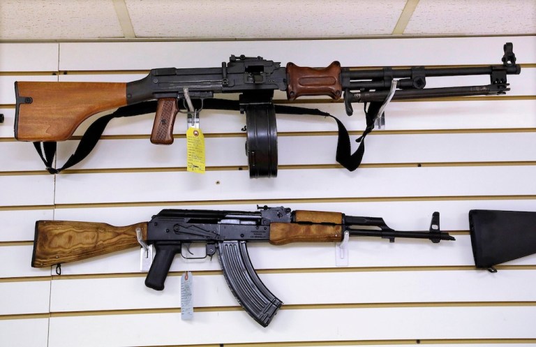 FILE - Weapons are displayed for sale at Capitol City Arms Supply, Jan. 16, 2013, in Springfield, Ill. (AP Photo/Seth Perlman, File)