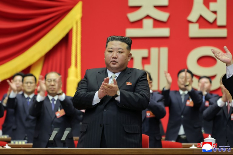 This photo provided Monday, Feb. 23, 2026, by the North Korean government, its leader Kim Jong Un, center, claps hands as he was re-elected to the top post of the ruling Workers’ Party, during the party's Congress in Pyongyang, Sunday, Feb. 22, 2026. Independent journalists were not given access to cover the event depicted in this image distributed by the North Korean government. The content of this image is as provided and cannot be independently verified. Korean language watermark on image as provided by source reads: 