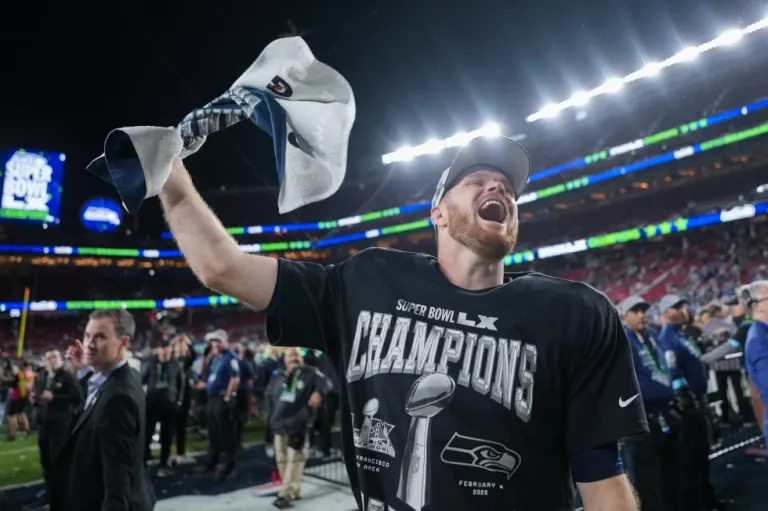 Seattle Seahawks quarterback Sam Darnold celebrates after a win over the New England Patriots in the NFL Super Bowl 60 football game, Sunday, Feb. 8, 2026, in Santa Clara, CA. (AP Photo/Matt Slocum)