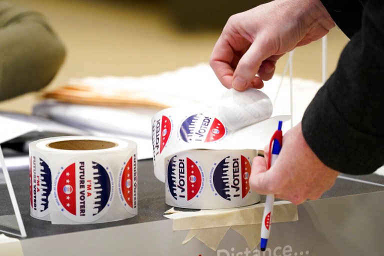 A voter helps himself to an 