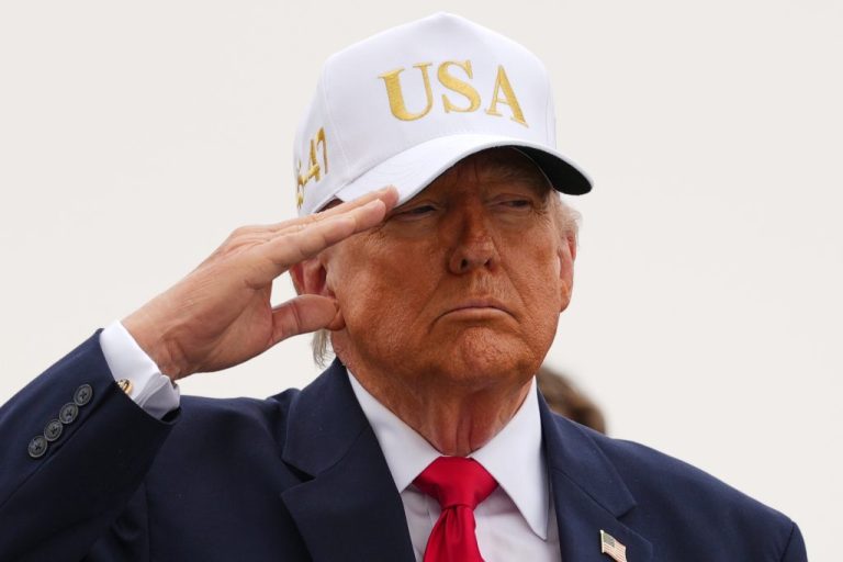 President Donald Trump salutes