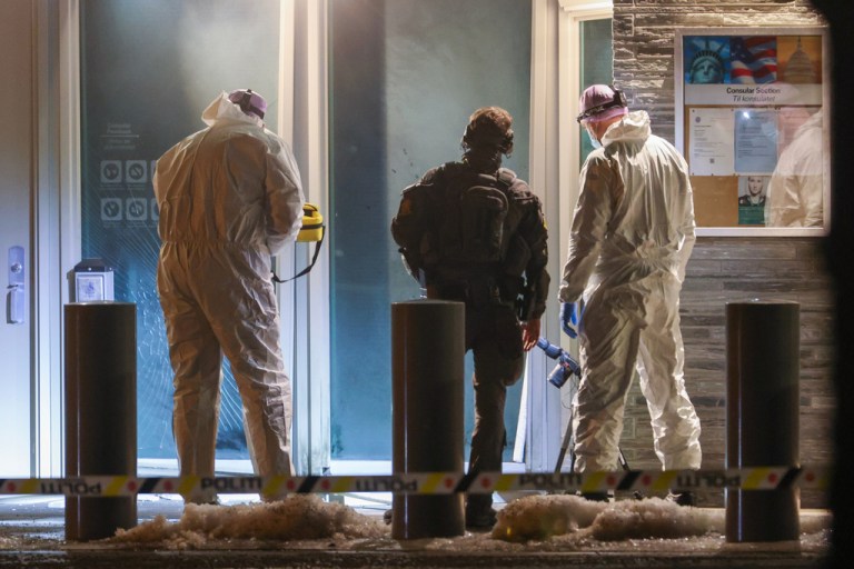 Norwegian police and technicians attend at the U.S. Embassy in Oslo, Norway