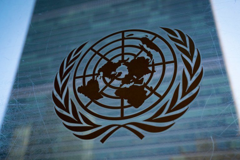 The symbol of the United Nations is displayed outside the Secretariat Building.
