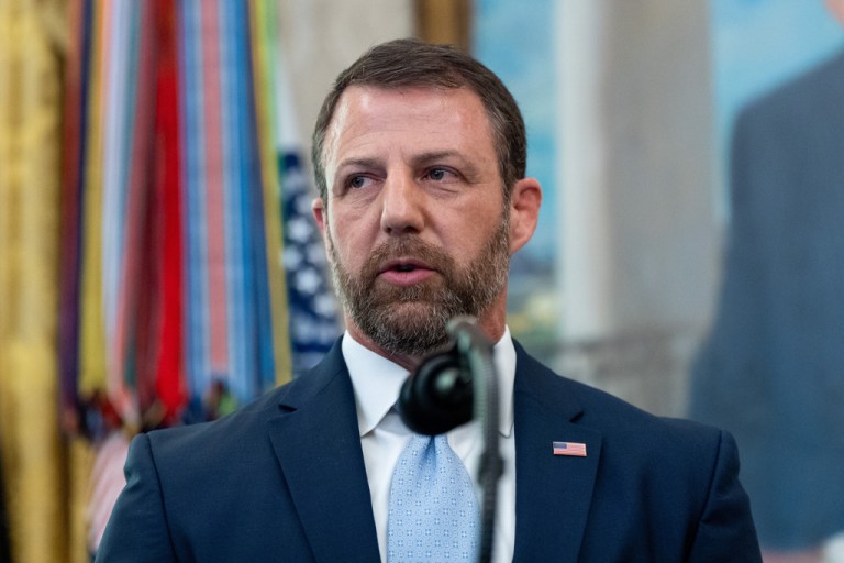 Homeland Security Secretary Markwayne Mullin speaks in the Oval Office of the White House.