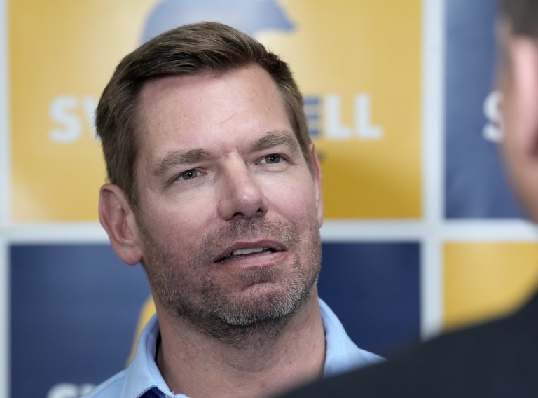 California gubernatorial candidate, Rep. Eric Swalwell, D-CA, talks with reporters after holding a town hall meeting in Sacramento, Calif., Tuesday, April 7, 2026. (AP Photo/Rich Pedroncelli)