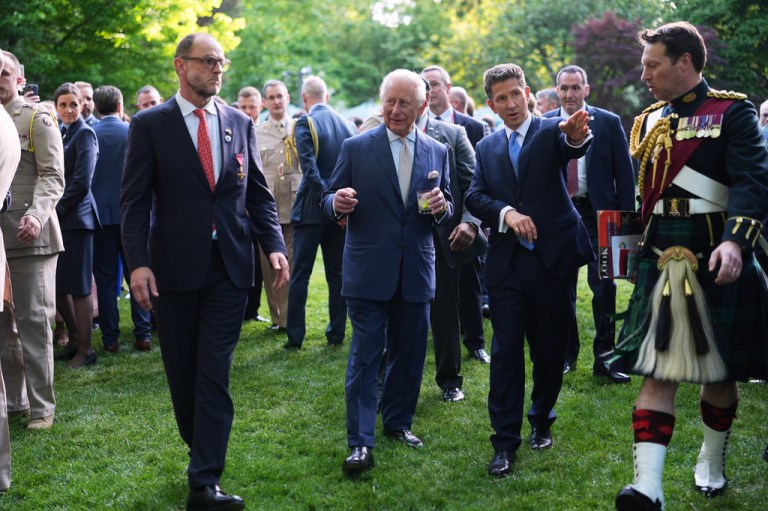 Britain's King Charles III and British Ambassador to the U.S. Christian Turner.