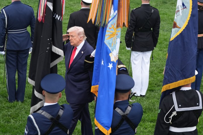 President Donald Trump and Britain's King Charles III review the troops during a State Visit arrival ceremony on the South Lawn of the White House, Tuesday, April 28, 2026, in Washington.