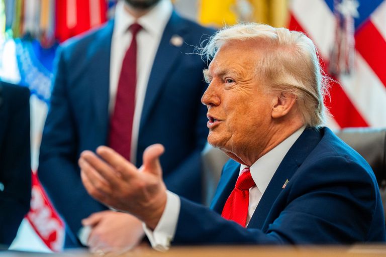 President Donald Trump speaks during the signing of Executive Orders in the Oval Office