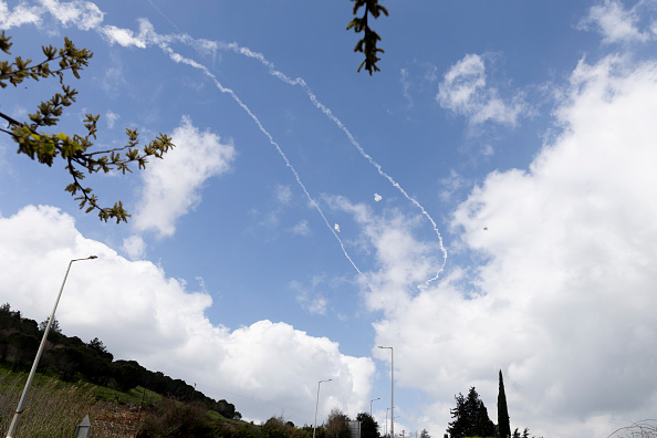 Missiles launched from Israel intercept rockets lauunched from Lebanon on on April 9, 2026 in Northern Lebanon, Israel. President Donald Trump announced a two-week ceasefire between the US and Iran on his Truth Social platform, conditional on shipping being allowed to resume through the Strait of Hormuz. The IDF has said it will observe the ceasefire with Iran but will continue military targeting Hezbollah in Lebanon.