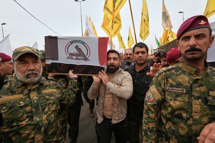 Members of the Popular Mobilization Forces attend a funeral.