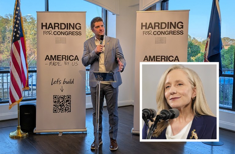 Philip Harding speaking into a microphone