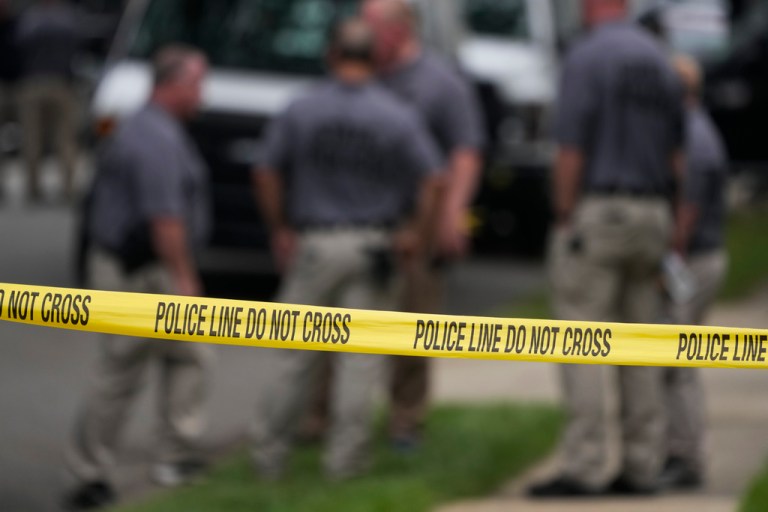 FILE - Authorities continue to work at the home of suspect Rex Heuermann, who has been charged with killing at least four women in the long-unsolved slayings known as the Gilgo Beach killings, in Massapequa Park, N.Y., July 24, 2023.